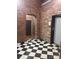 Checkerboard floor hallway with elevator access at 201 S Hoskins Rd # 136, Charlotte, NC 28208