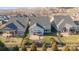 Aerial view of a home with a well-maintained backyard and patio area at 253 Stone Mountain Way, Denver, NC 28037