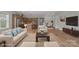 Open floor plan with a kitchen, living room, and dining area for easy entertaining at 253 Stone Mountain Way, Denver, NC 28037