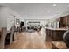 Open-concept living area featuring hardwood floors, recessed lighting, and a modern interior design at 253 Stone Mountain Way, Denver, NC 28037