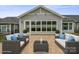 Inviting outdoor patio with comfortable seating and stylish decor for relaxation at 253 Stone Mountain Way, Denver, NC 28037