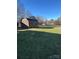 Large backyard with storage shed and open green space at 2805 N Main St, Kannapolis, NC 28081