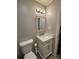 Clean bathroom with a white vanity and marble countertop at 2805 N Main St, Kannapolis, NC 28081