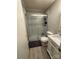 Modern bathroom with a frameless shower and marble vanity at 2805 N Main St, Kannapolis, NC 28081