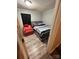 Cozy bedroom featuring a gray upholstered bed and red accent chair at 2805 N Main St, Kannapolis, NC 28081