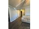 Clean and bright hallway with gray walls and wood-look floors at 2805 N Main St, Kannapolis, NC 28081