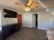 Bright living room featuring light beige couches and a large TV at 2805 N Main St, Kannapolis, NC 28081