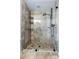 Modern bathroom featuring a walk-in shower with decorative tile and glass enclosure at 3317 Ritch Ave, Charlotte, NC 28206