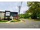 Street view of area with businesses, greenery, and crosswalk at 3317 Ritch Ave, Charlotte, NC 28206