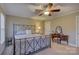 Spacious bedroom with a large bed and vanity set at 4414 Wyman Ln, Charlotte, NC 28226