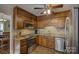 Kitchen with stainless steel appliances and wood cabinets at 4414 Wyman Ln, Charlotte, NC 28226