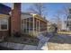 Spacious screened porch with brick flooring and access to the backyard at 4414 Wyman Ln, Charlotte, NC 28226