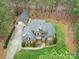 Aerial view of house, detached garage, and driveway at 7282 James Ct, Denver, NC 28037
