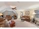 Large bonus room with comfortable seating and natural light at 7282 James Ct, Denver, NC 28037