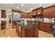 Well-equipped kitchen with island, granite countertops, and stainless steel appliances at 7282 James Ct, Denver, NC 28037