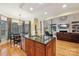 Open concept kitchen with large island, breakfast nook, and Gathering room views at 7282 James Ct, Denver, NC 28037