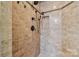 Spa-like shower with tile surround and multiple shower heads at 7282 James Ct, Denver, NC 28037