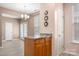 Kitchen island with granite countertop and oak cabinets at 729 Torrey Pines Ln, Fort Mill, SC 29715