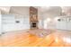 Living room with stone fireplace and built-in shelving at 9065 Burroughs Ct, Sherrills Ford, NC 28673