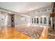 High-ceilinged living room with fireplace and hardwood floors at 9065 Burroughs Ct, Sherrills Ford, NC 28673