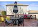 A spacious back deck with comfortable seating is perfect for outdoor relaxation at 9415 Rosalyn Glen Rd, Cornelius, NC 28031
