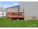 Enjoy a back yard deck with patio seating with space to grill and relax in the sun at 9415 Rosalyn Glen Rd, Cornelius, NC 28031