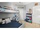A bedroom with bunk beds, ladder, airplane decor, and a reading nook at 9415 Rosalyn Glen Rd, Cornelius, NC 28031
