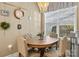 A cozy breakfast nook with natural light is a perfect place to start the day at 9415 Rosalyn Glen Rd, Cornelius, NC 28031