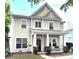 Attractive home with a covered porch, showcasing a well-maintained exterior and a desirable location at 9415 Rosalyn Glen Rd, Cornelius, NC 28031