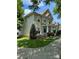 Inviting two-story home features a lovely front porch and lush green lawn at 9415 Rosalyn Glen Rd, Cornelius, NC 28031