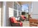 A charming front porch with cozy seating offers a relaxing outdoor space at 9415 Rosalyn Glen Rd, Cornelius, NC 28031
