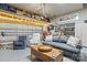 Garage space includes seating area, storage, and epoxy floors at 9415 Rosalyn Glen Rd, Cornelius, NC 28031