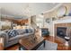 Comfortable living room with fireplace, hardwood floors, and open floor plan at 9415 Rosalyn Glen Rd, Cornelius, NC 28031