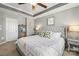 Comfortable main bedroom featuring a soft color palette, plush bedding, and ample natural light at 9415 Rosalyn Glen Rd, Cornelius, NC 28031