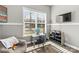 A playroom with seating, games, and natural light is a perfect activity space at 9415 Rosalyn Glen Rd, Cornelius, NC 28031