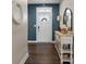 Entryway with dark hardwood floors and a console table at 10225 Black Locust Ln, Charlotte, NC 28215