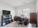 Home office with built-in desk and bookcases at 10225 Black Locust Ln, Charlotte, NC 28215