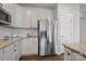 Modern kitchen with stainless steel appliances and granite countertops at 10225 Black Locust Ln, Charlotte, NC 28215