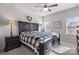 Main bedroom with king-size bed and ensuite bathroom at 10225 Black Locust Ln, Charlotte, NC 28215