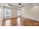 Bright bedroom with hardwood floors and ceiling fan at 104 Brookview Dr, Shelby, NC 28152