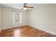 Bright bedroom featuring hardwood floors and a window at 104 Brookview Dr, Shelby, NC 28152