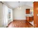 Bright dining room with hardwood floors and built-in cabinetry at 104 Brookview Dr, Shelby, NC 28152