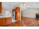 Kitchen with wood cabinets, stainless steel appliances, and hardwood floors at 104 Brookview Dr, Shelby, NC 28152