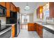 Kitchen with stainless steel appliances and wood cabinets at 104 Brookview Dr, Shelby, NC 28152