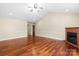 Vaulted ceiling living room with hardwood floors and fireplace at 104 Brookview Dr, Shelby, NC 28152