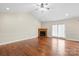 Spacious living room with hardwood floors, fireplace, and high ceilings at 104 Brookview Dr, Shelby, NC 28152