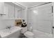 Clean bathroom with a shower/tub combo and white vanity at 1115 Scaleybark Rd # D, Charlotte, NC 28209