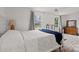 Bedroom with full-size bed, dresser and large window at 1115 Scaleybark Rd # D, Charlotte, NC 28209