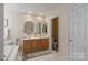 Bathroom with double vanity, soaking tub and separate shower at 117 Biscayne Ct, Mooresville, NC 28117