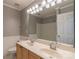 Bathroom featuring double sinks with wood cabinets and a large mirror at 117 Biscayne Ct, Mooresville, NC 28117